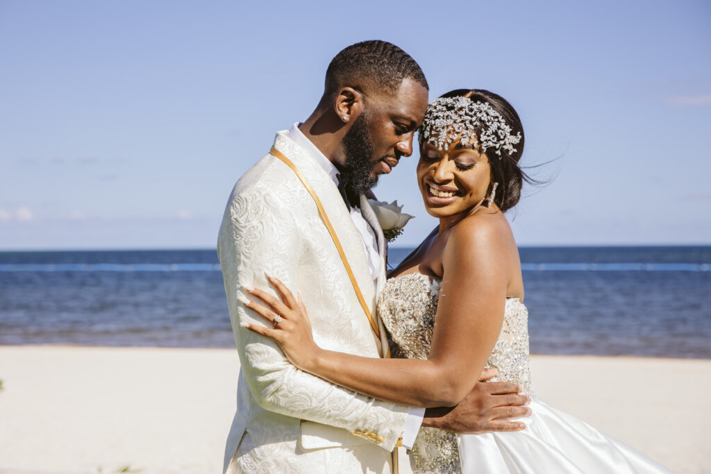 The Grand at Moon Palace in Cancun, Mexico, hosts couples' traditional Nigerian & White Weddings with Benin attire and Ankara patterns.