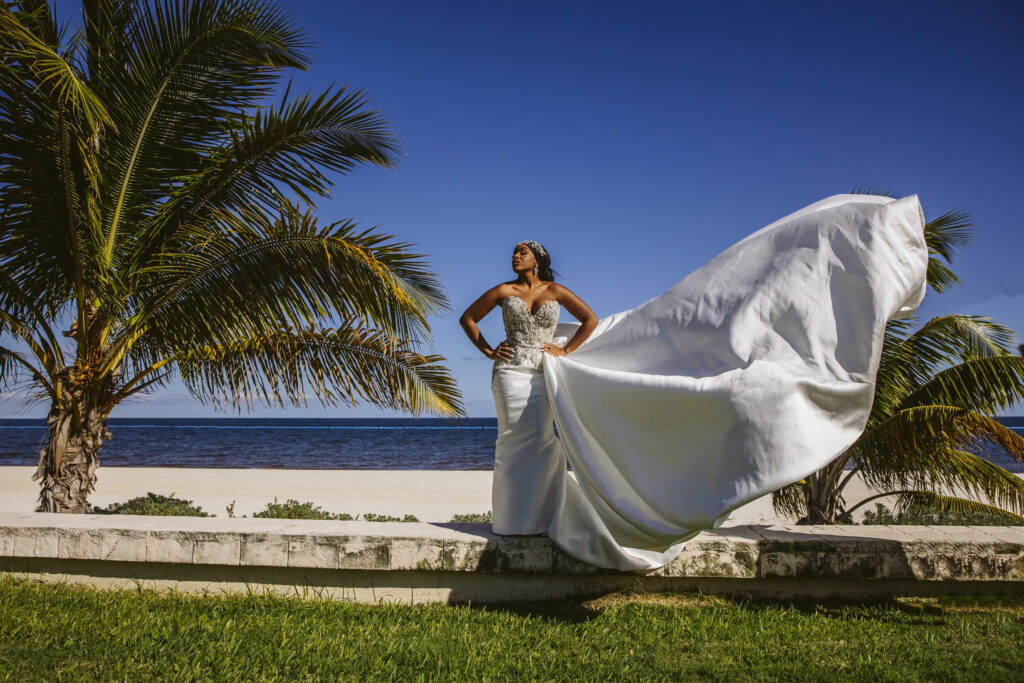 The Grand at Moon Palace in Cancun, Mexico, hosts couples' traditional Nigerian & White Weddings with Benin attire and Ankara patterns.