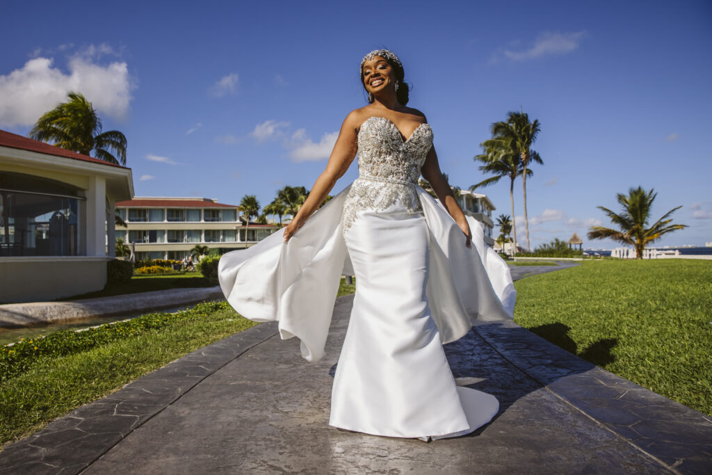 The Grand at Moon Palace in Cancun, Mexico, hosts couples' traditional Nigerian & White Weddings with Benin attire and Ankara patterns.