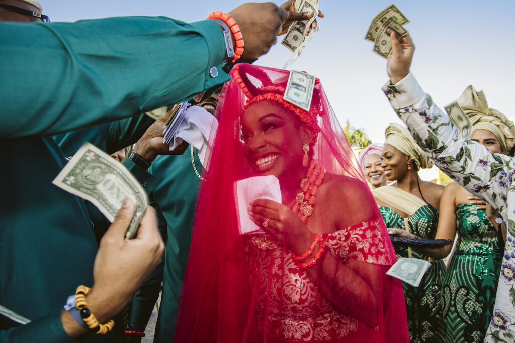 The Grand at Moon Palace in Cancun, Mexico, hosts couples' traditional Nigerian & White Weddings with Benin attire and Ankara patterns.