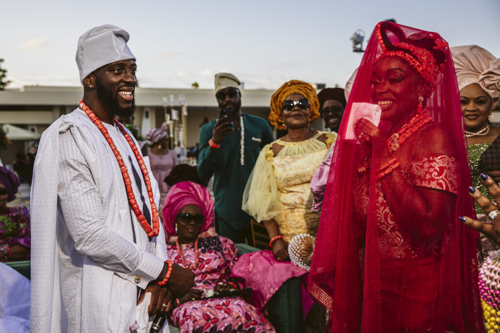 The Grand at Moon Palace in Cancun, Mexico, hosts couples' traditional Nigerian & White Weddings with Benin attire and Ankara patterns.