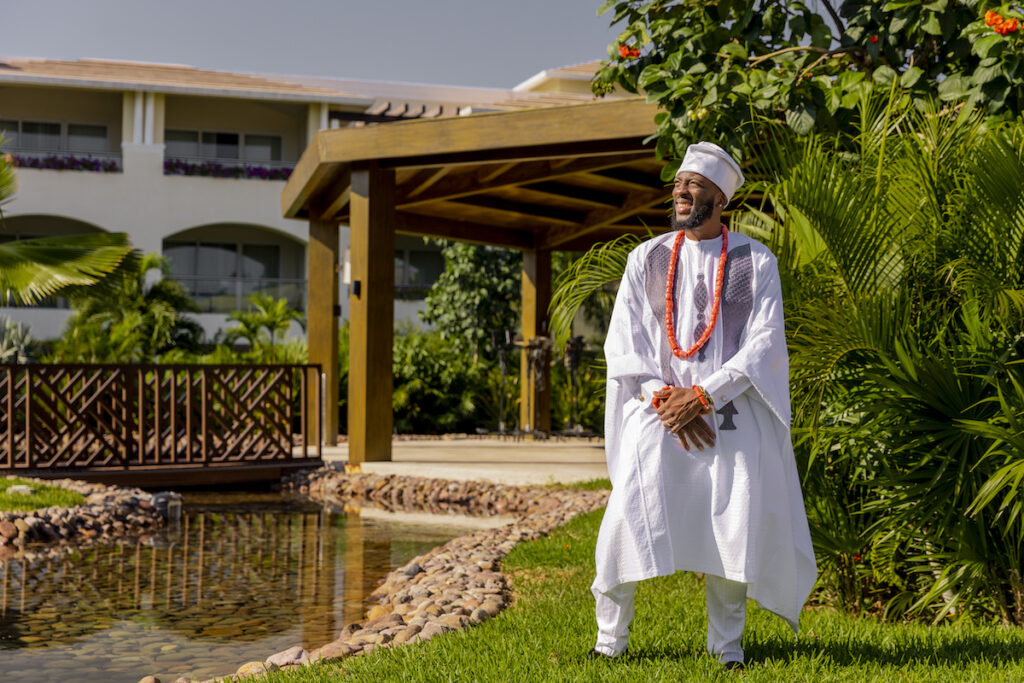 The Grand at Moon Palace in Cancun, Mexico, hosts couples' traditional Nigerian & White Weddings with Benin attire and Ankara patterns.