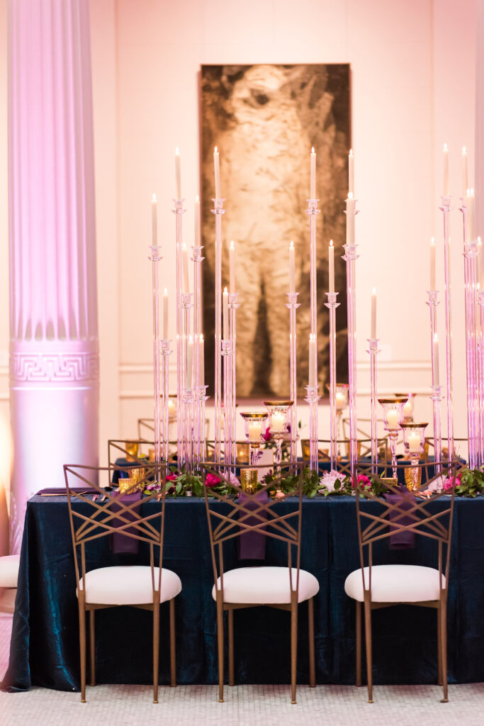 Indian nuptials features fuchsia florals, a sangeet pre-wedding party, and a stunning Hindu wedding ceremony at the New Orleans Museum of Art. 