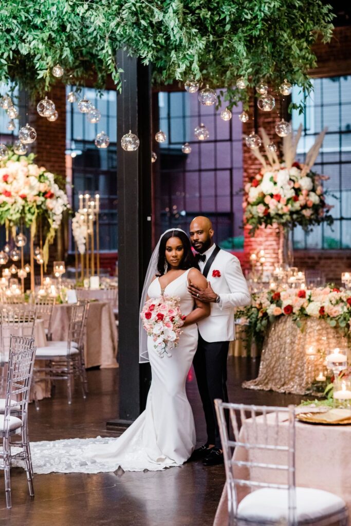 While Orlando and Canetra's wedding at The Foundry at Puritan Mill is "simply elegant," there was nothing simple about their stunning nuptials!