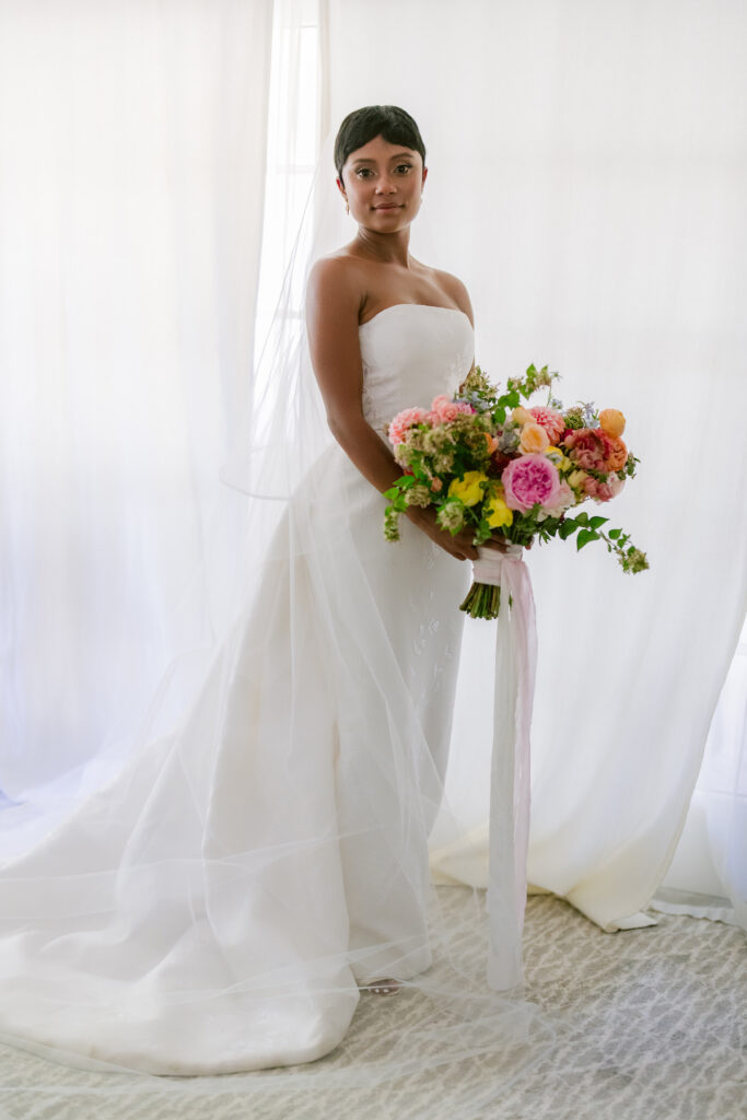 Bursting with colorful summer florals and sweet details, love blooms in this private estate wedding at the bride's grandmother's home in Walnut Creek, California.