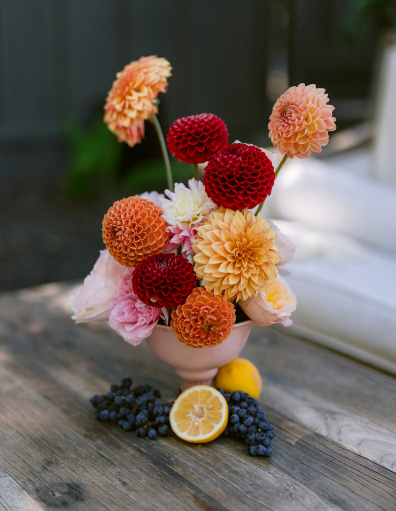 Bursting with colorful summer florals and sweet details, love blooms in this private estate wedding at the bride's grandmother's home in Walnut Creek, California.