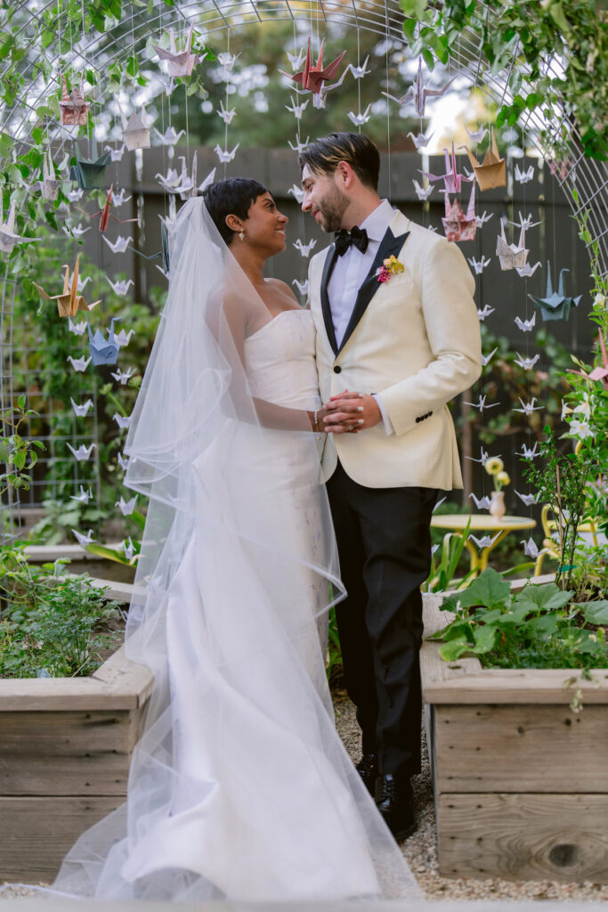 Bursting with colorful summer florals and sweet details, love blooms in this private estate wedding at the bride's grandmother's home in Walnut Creek, California.