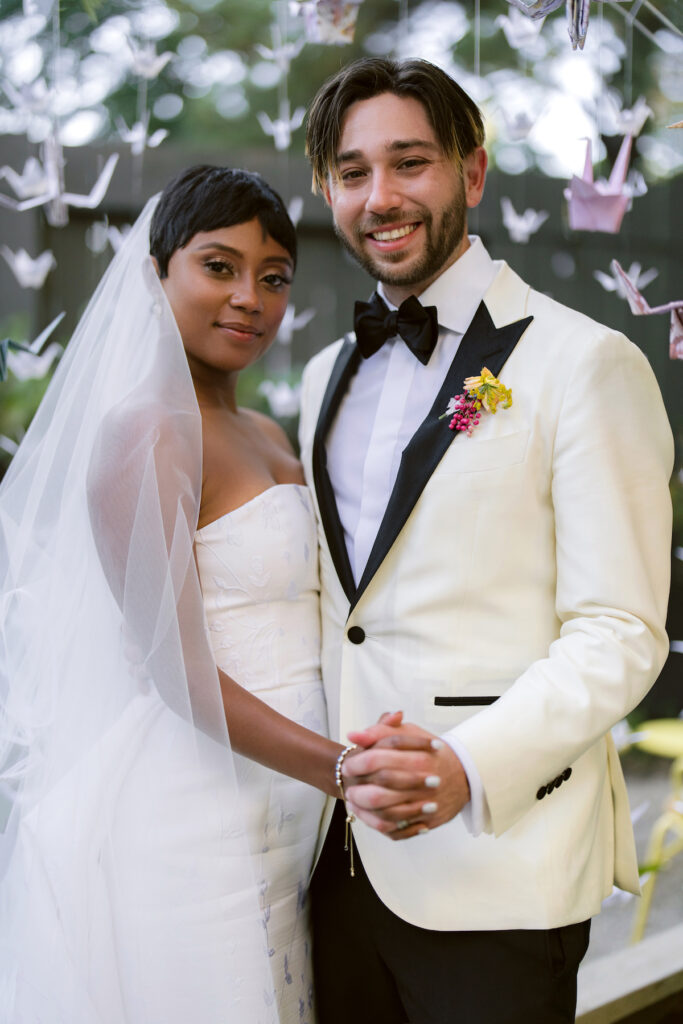 Bursting with colorful summer florals and sweet details, love blooms in this private estate wedding at the bride's grandmother's home in Walnut Creek, California.