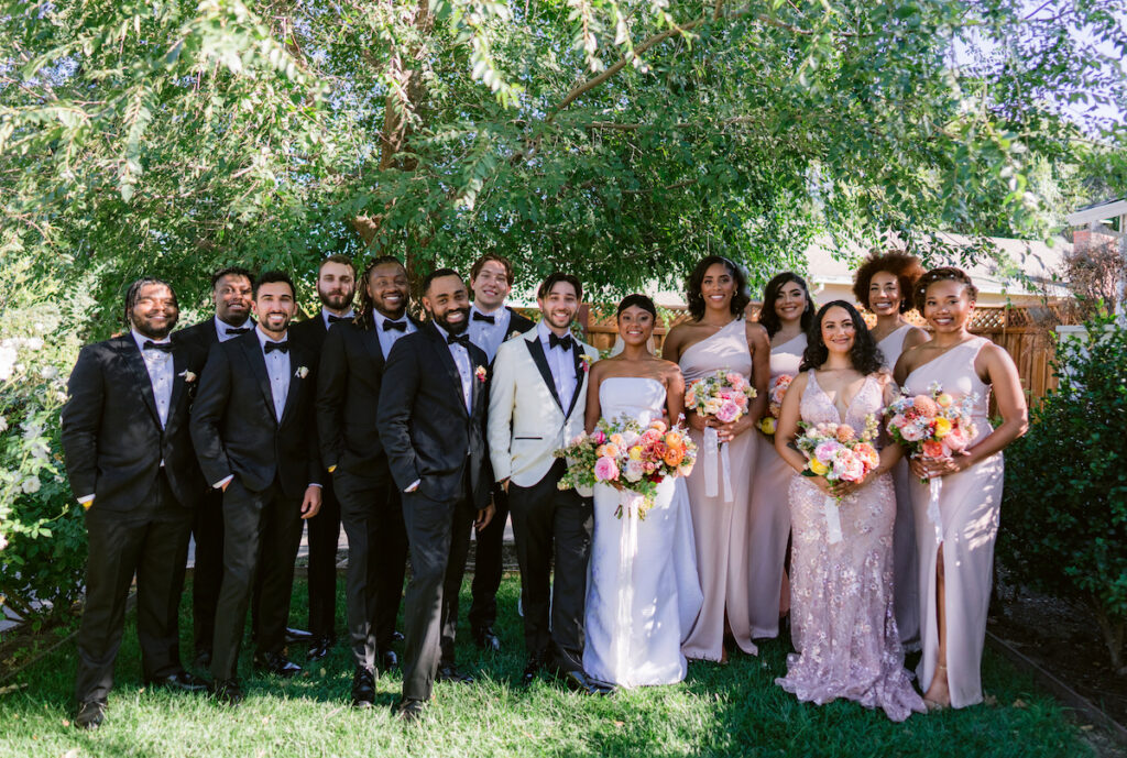 Bursting with colorful summer florals and sweet details, love blooms in this private estate wedding at the bride's grandmother's home in Walnut Creek, California.