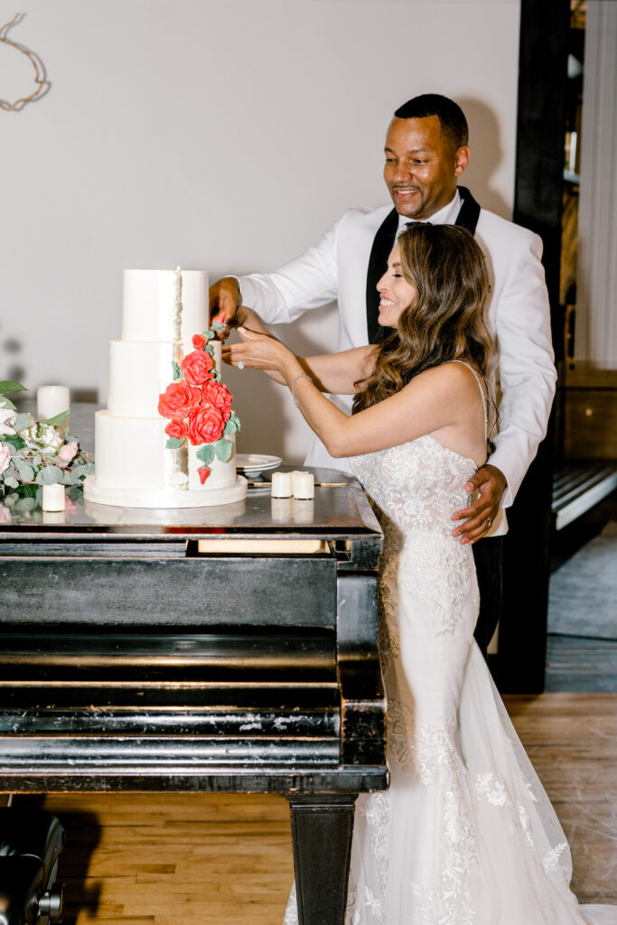 This waterfront wedding at the Tyee Yacht Club in Seattle, WA, features soft pink blooms, pops of red, and a bilingual English/Spanish ceremony.