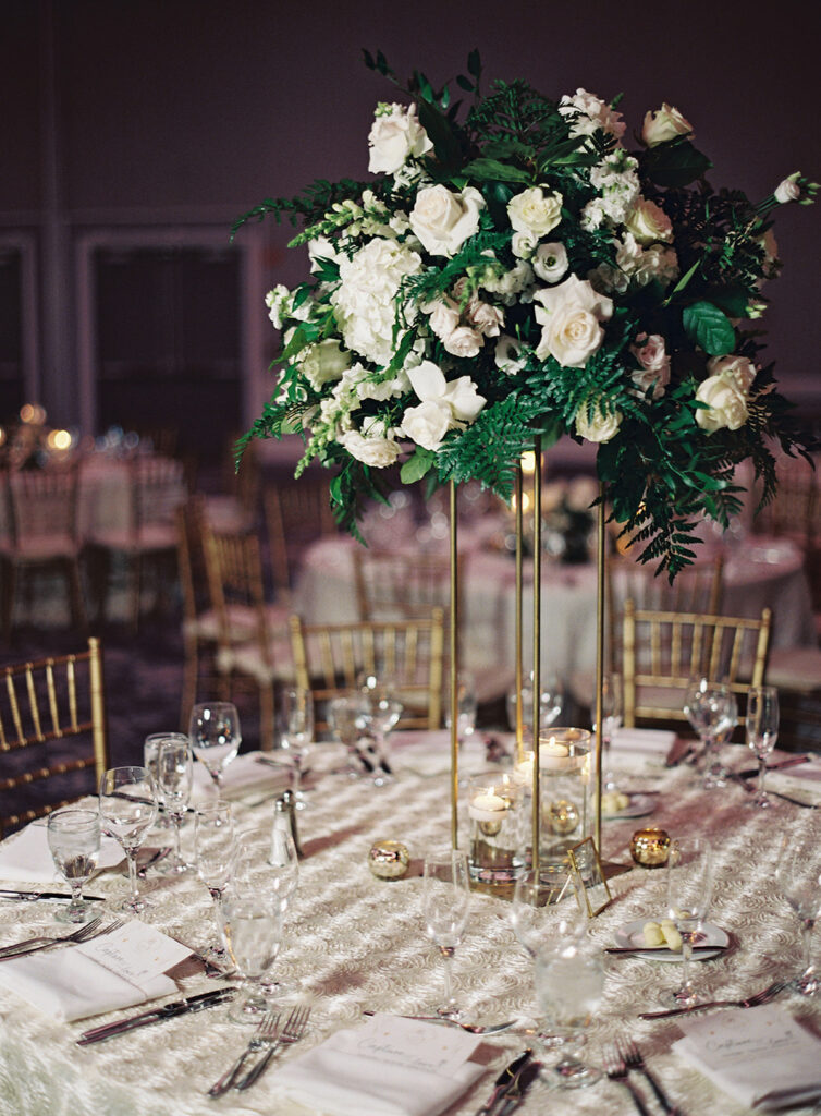 Attorneys say "I Do!" in a romantic outdoor ceremony at the Lansdowne Resort in Leesburg, VA. Featuring classy decor, gold details, and a gorgeous custom gown by Berta Bridal. 