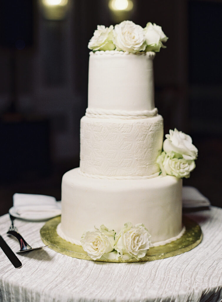 Attorneys say "I Do!" in a romantic outdoor ceremony at the Lansdowne Resort in Leesburg, VA. Featuring classy decor, gold details, and a gorgeous custom gown by Berta Bridal. 