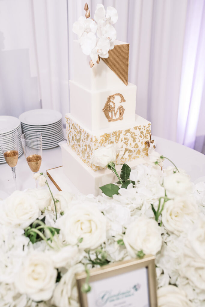High school sweethearts, Shinead and Maurice, tied the knot at their classy gold and white wedding in Myrtle Beach, South Carolina!