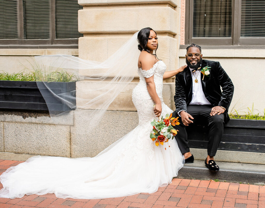 Military couple weds in a classy and timeless ceremony at 1208 Washington Place in Columbia, SC, with autumnal hues and historic charm. 