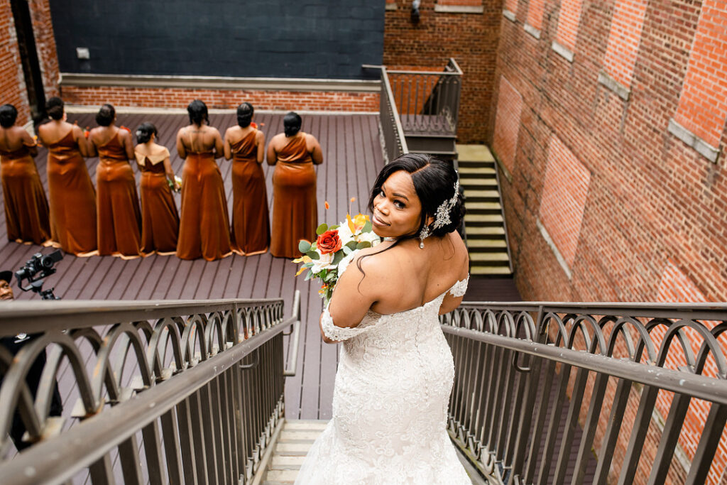 Military couple weds in a classy and timeless ceremony at 1208 Washington Place in Columbia, SC, with autumnal hues and historic charm. 