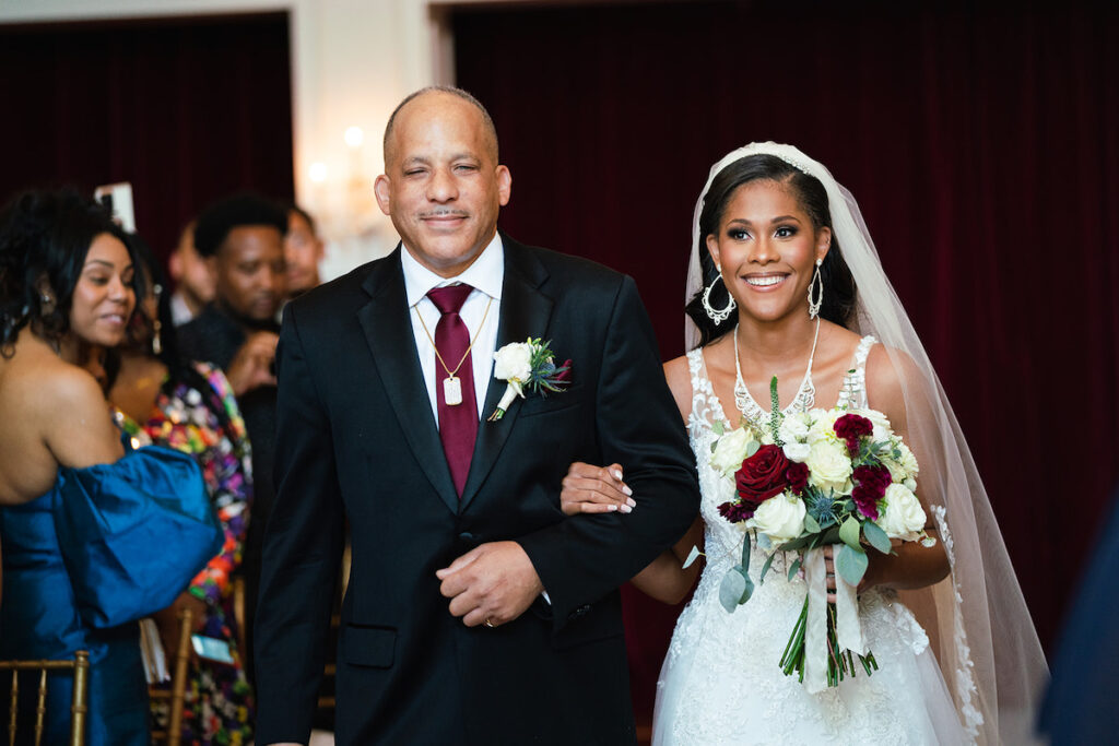 The Datcher's timeless wedding at Rose Hill Manor in Leesburg, Virginia, exudes the utmost sophistication with an emotional first touch, a rich burgundy and ivory color palette, and a lively reception.