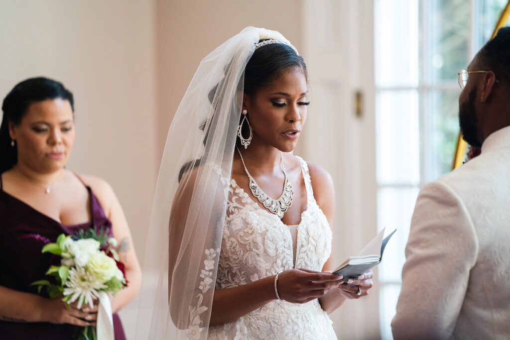 The Datcher's timeless wedding at Rose Hill Manor in Leesburg, Virginia, exudes the utmost sophistication with an emotional first touch, a rich burgundy and ivory color palette, and a lively reception.