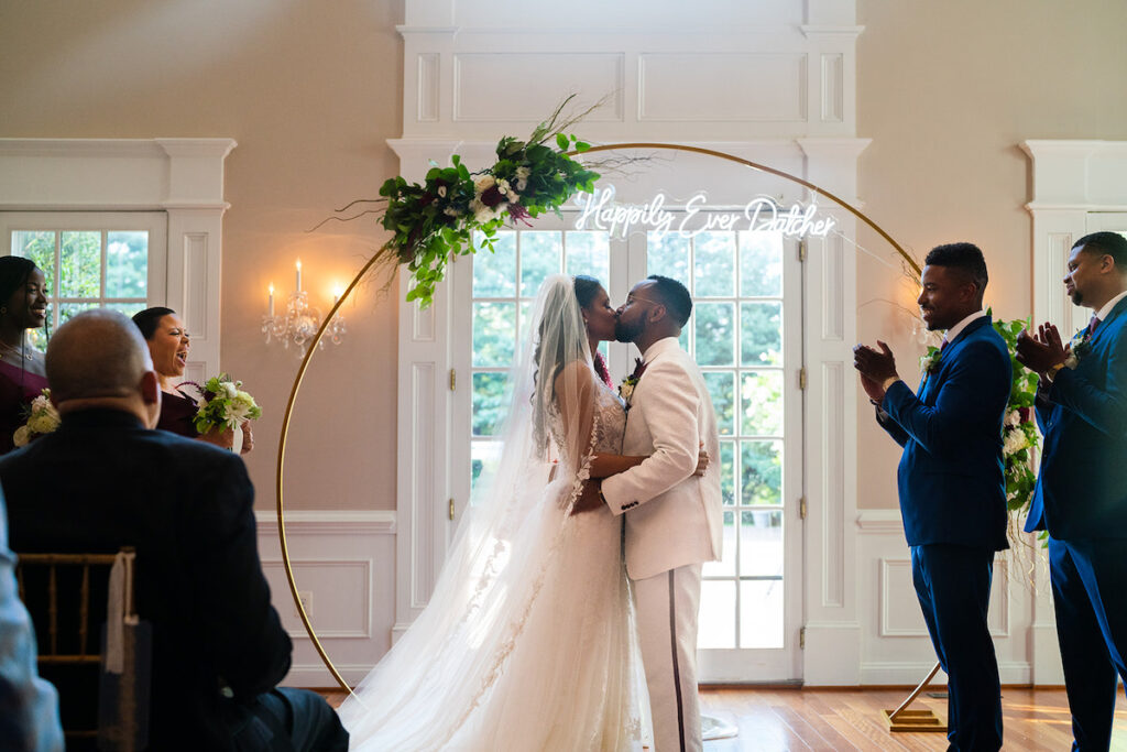 The Datcher's timeless wedding at Rose Hill Manor in Leesburg, Virginia, exudes the utmost sophistication with an emotional first touch, a rich burgundy and ivory color palette, and a lively reception.