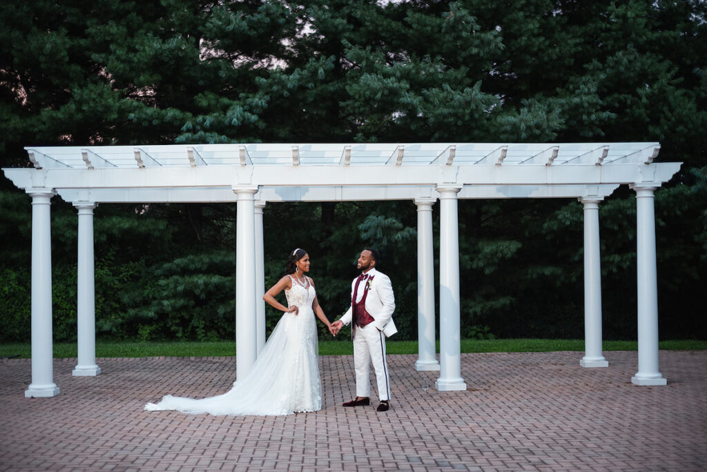 The Datcher's timeless wedding at Rose Hill Manor in Leesburg, Virginia, exudes the utmost sophistication with an emotional first touch, a rich burgundy and ivory color palette, and a lively reception.