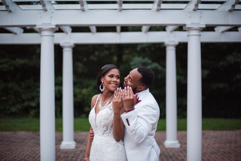 The Datcher's timeless wedding at Rose Hill Manor in Leesburg, Virginia, exudes the utmost sophistication with an emotional first touch, a rich burgundy and ivory color palette, and a lively reception.