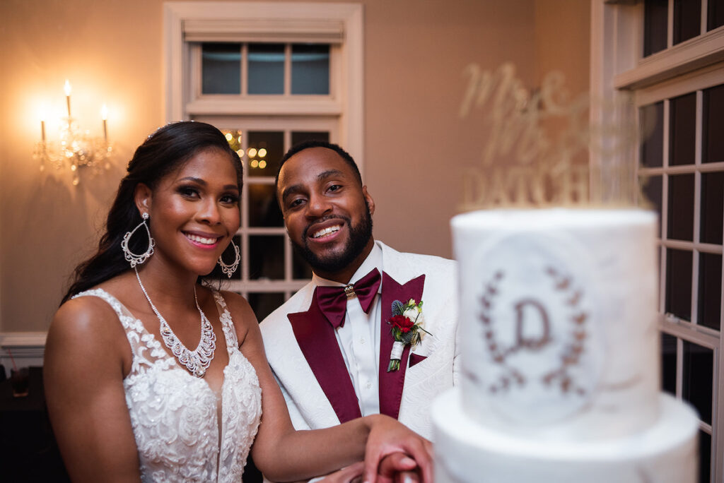 The Datcher's timeless wedding at Rose Hill Manor in Leesburg, Virginia, exudes the utmost sophistication with an emotional first touch, a rich burgundy and ivory color palette, and a lively reception.
