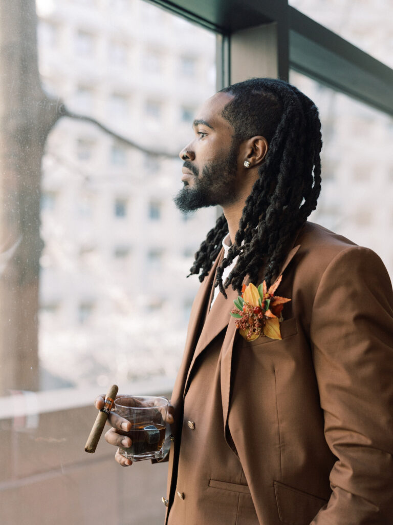 Focusing on the perspective of the groom, this unique cigar and whiskey-styled shoot captures masculine elegance!