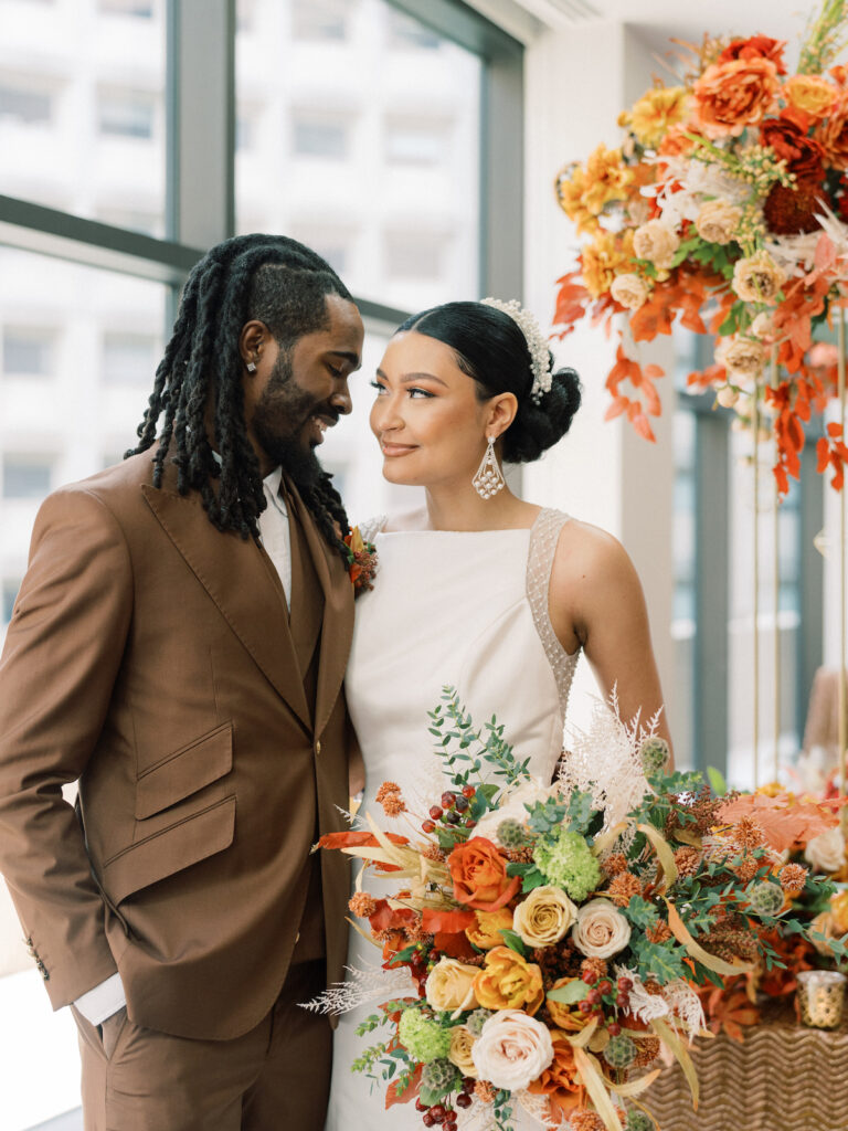 Focusing on the perspective of the groom, this unique cigar and whiskey-styled shoot captures masculine elegance!