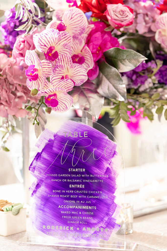 The Wooten's Rip The Runway-Themed wedding in North Carolina serves looks and love with colorful berry-hued florals and modern decor!