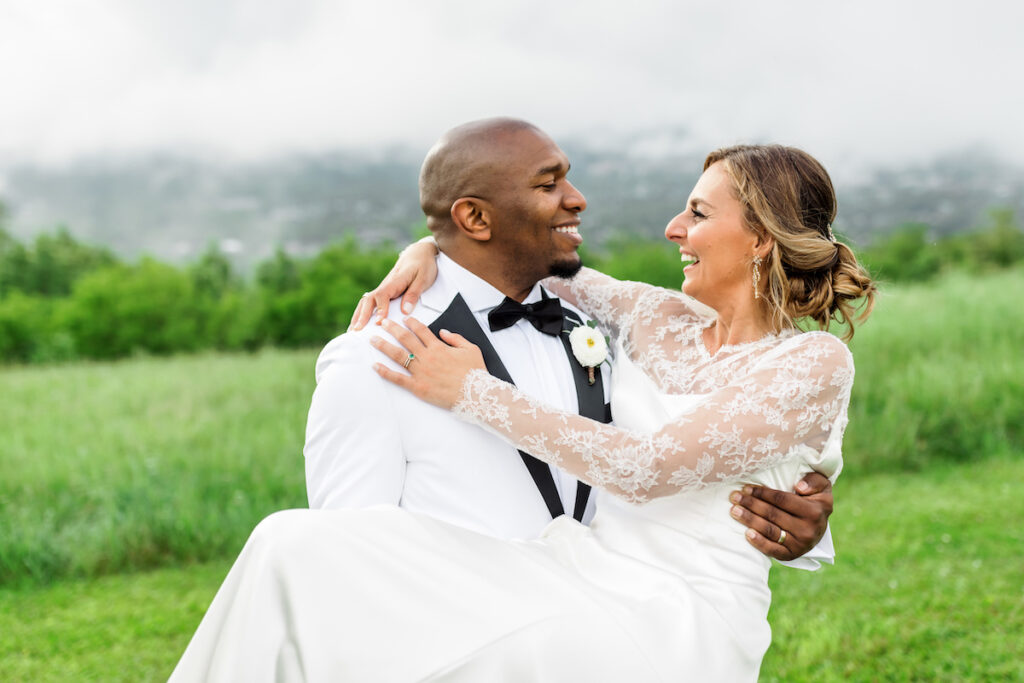 Wedding day showers couldn't put a damper on Merriam and Garry's outdoor wedding in Virginia held at Montalto overlooking Monticello.