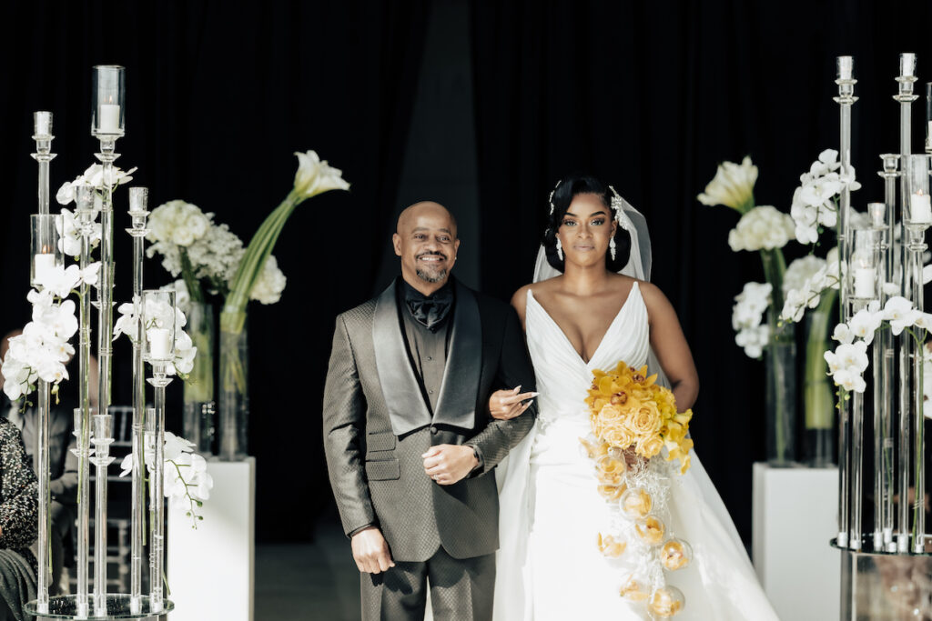 Featured in MunaLuchi Bridal Magazine Issue 29, T'Kiyah and Christopher’s waterfront wedding at the Half Moone Celebration Center in Norfolk, Virginia, was a dreamy affair.