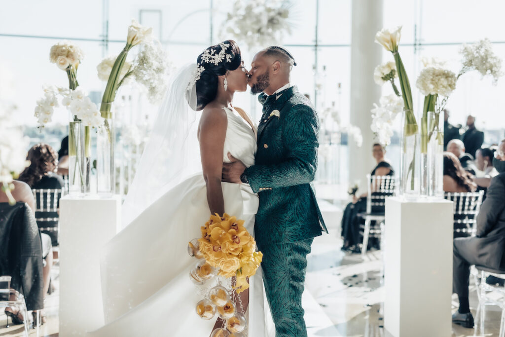 Featured in MunaLuchi Bridal Magazine Issue 29, T'Kiyah and Christopher’s waterfront wedding at the Half Moone Celebration Center in Norfolk, Virginia, was a dreamy affair.
