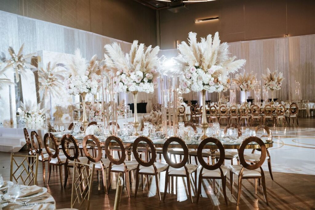 Featured in Issue 29, Cooma and Jared's elevated wedding featured bohemian chic vibes with two gorgeous wedding dresses and luxurious decor.