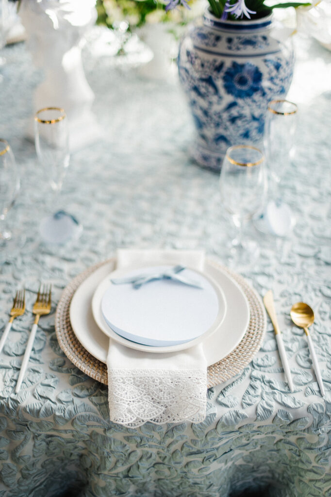 Featured in Issue 29, Styled Shoots Across America team create a romantic wedding editorial with blue hues at The Estate at River Run.