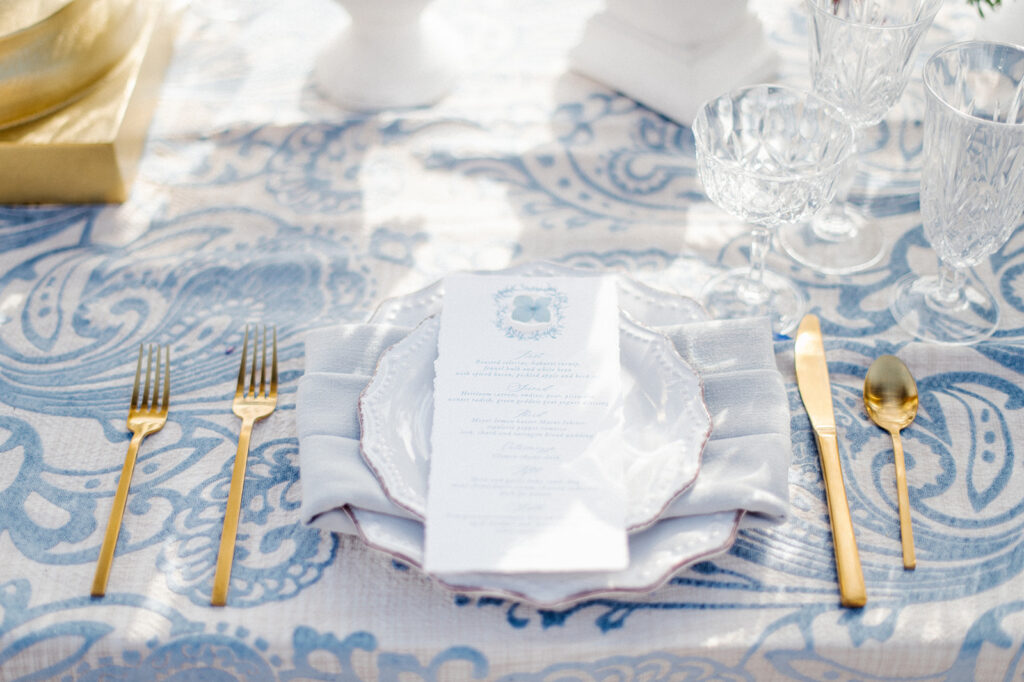Featured in Issue 29, Styled Shoots Across America team create a romantic wedding editorial with blue hues at The Estate at River Run.
