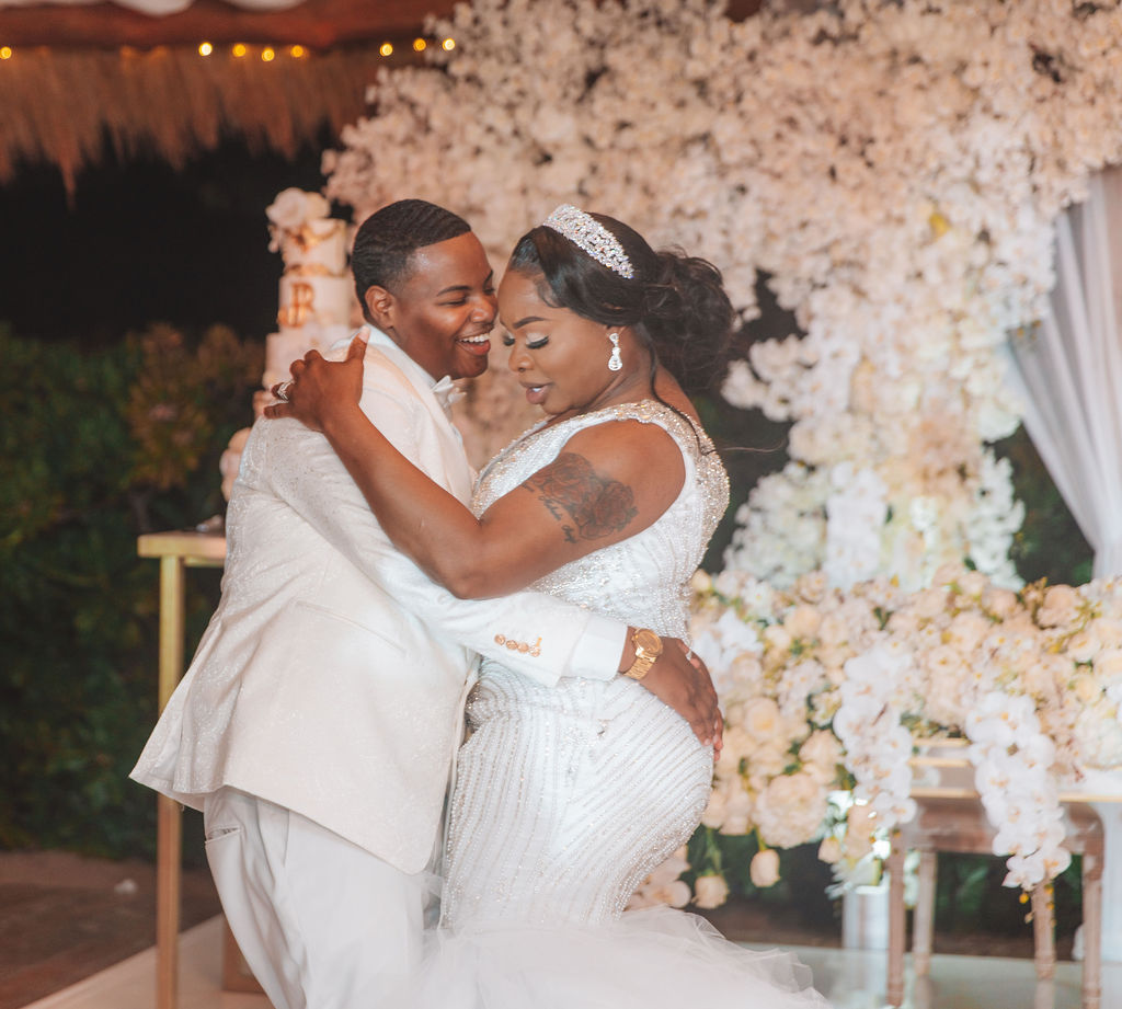 Beautiful brides say “I Do!” in a traditional and elegant destination wedding at the Finest Playa Mujeres in Mexico with lux florals & decor!