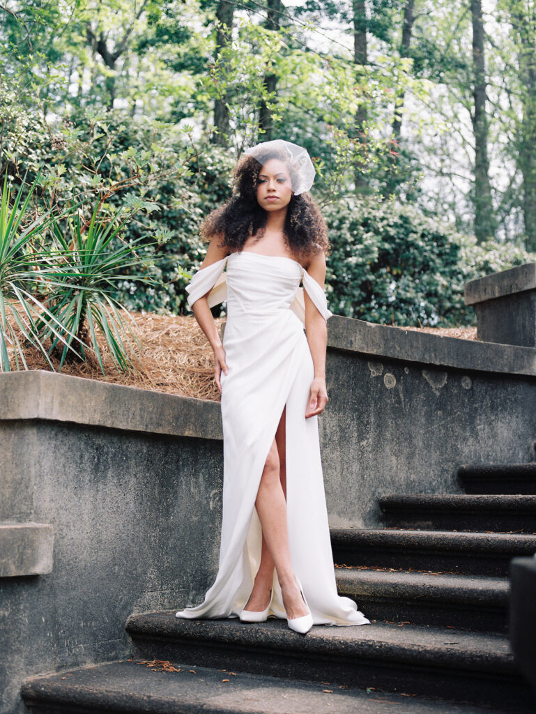 Inspired by the fresh feeling summer brings and the color yellow, this modern summer-styled shoot at the Swan House Atlanta History Center features a contemporary tablescape and decor with romantic touches and three fashion-forward bridal looks!