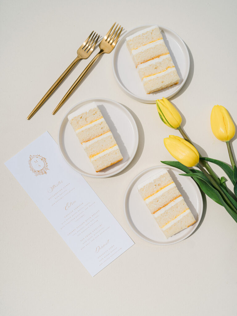 Inspired by the fresh feeling summer brings and the color yellow, this modern summer-styled shoot at the Swan House Atlanta History Center features a contemporary tablescape and decor with romantic touches and three fashion-forward bridal looks!