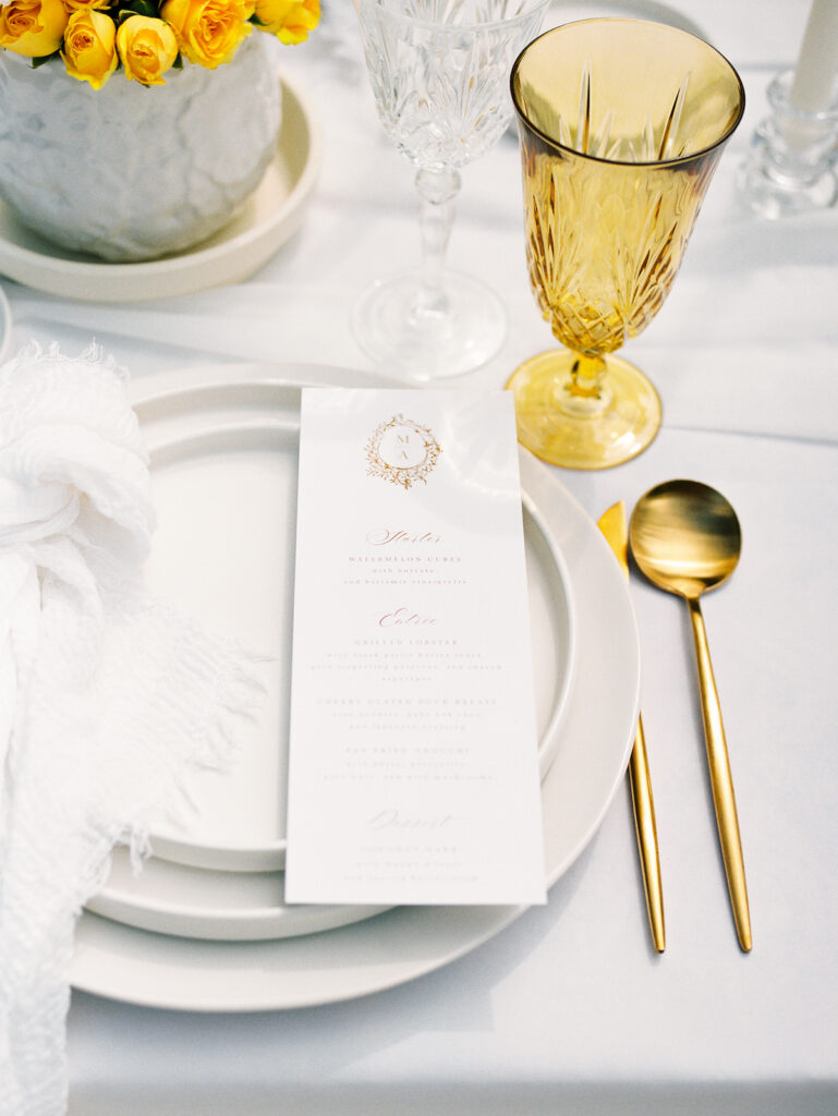 Inspired by the fresh feeling summer brings and the color yellow, this modern summer-styled shoot at the Swan House Atlanta History Center features a contemporary tablescape and decor with romantic touches and three fashion-forward bridal looks!