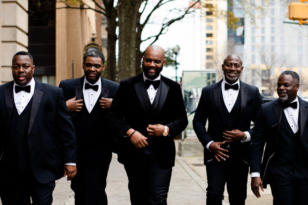 Jeremiah and Candace's luxe ballroom wedding in South Carolina featured oh-so-pretty red florals with an elegantly chic style.