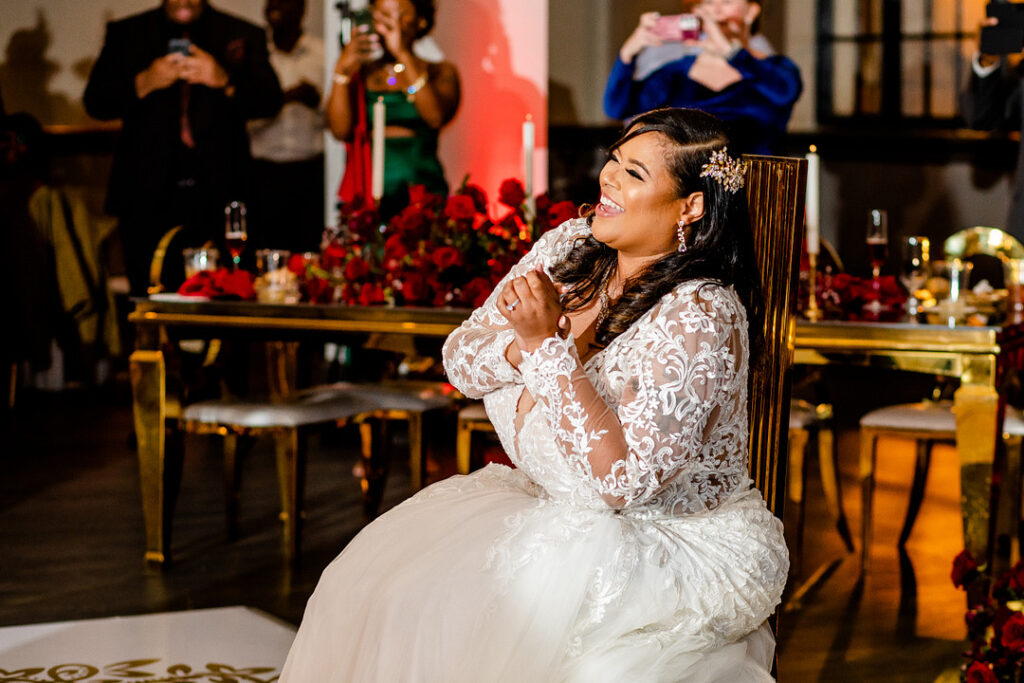 Jeremiah and Candace's luxe ballroom wedding in South Carolina featured oh-so-pretty red florals with an elegantly chic style.