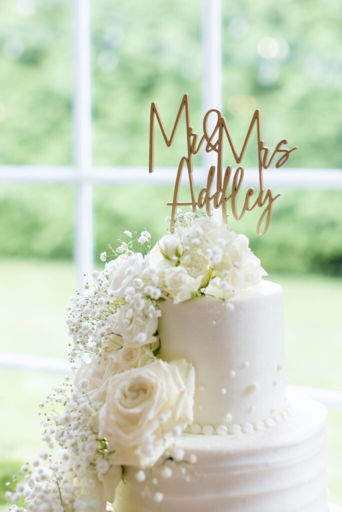 Haley and Jordan's elegant wedding at the Pen Ryn Mansion features lush greenery, personal details, and Jamaican cultural elements.
