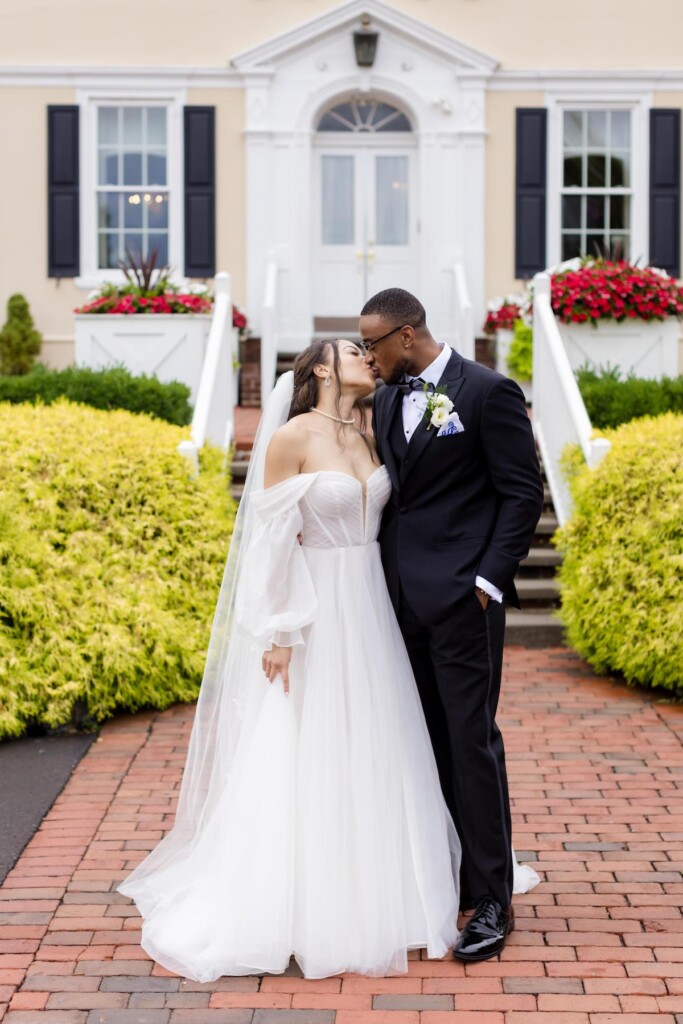 Haley and Jordan's elegant wedding at the Pen Ryn Mansion features lush greenery, personal details, and Jamaican cultural elements.