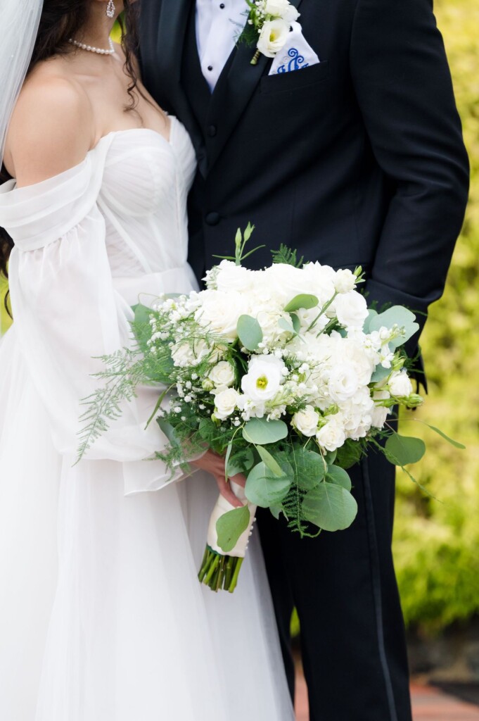 Haley and Jordan's elegant wedding at the Pen Ryn Mansion features lush greenery, personal details, and Jamaican cultural elements.