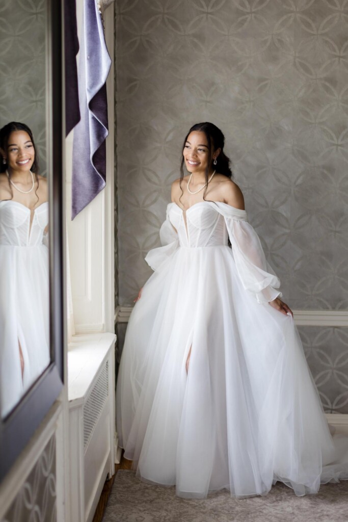 Haley and Jordan's elegant wedding at the Pen Ryn Mansion features lush greenery, personal details, and Jamaican cultural elements.
