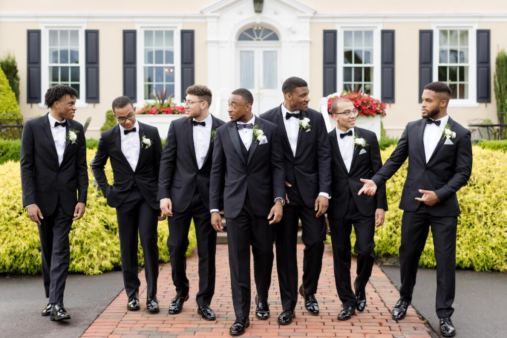 Haley and Jordan's elegant wedding at the Pen Ryn Mansion features lush greenery, personal details, and Jamaican cultural elements.