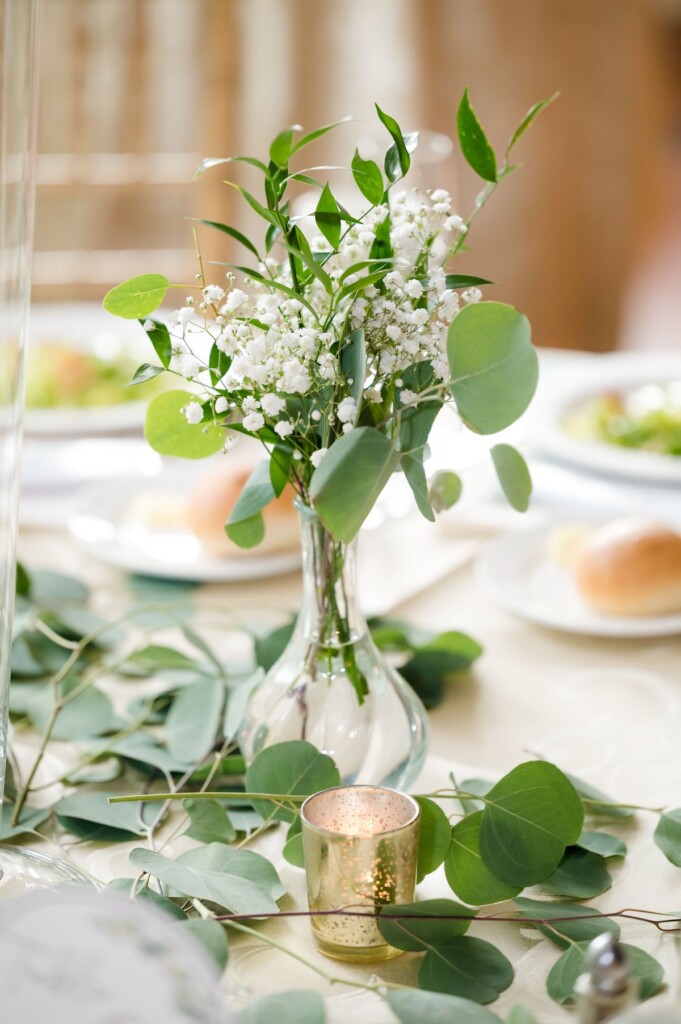 Haley and Jordan's elegant wedding at the Pen Ryn Mansion features lush greenery, personal details, and Jamaican cultural elements.