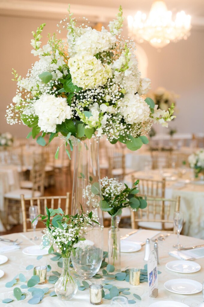 Haley and Jordan's elegant wedding at the Pen Ryn Mansion features lush greenery, personal details, and Jamaican cultural elements.