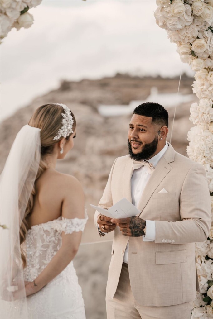 Featured in Issue 30, Jennifer and Zamir's modern & elegant elopement by the Sea in Santorini, Greece was everything they imagined and more.