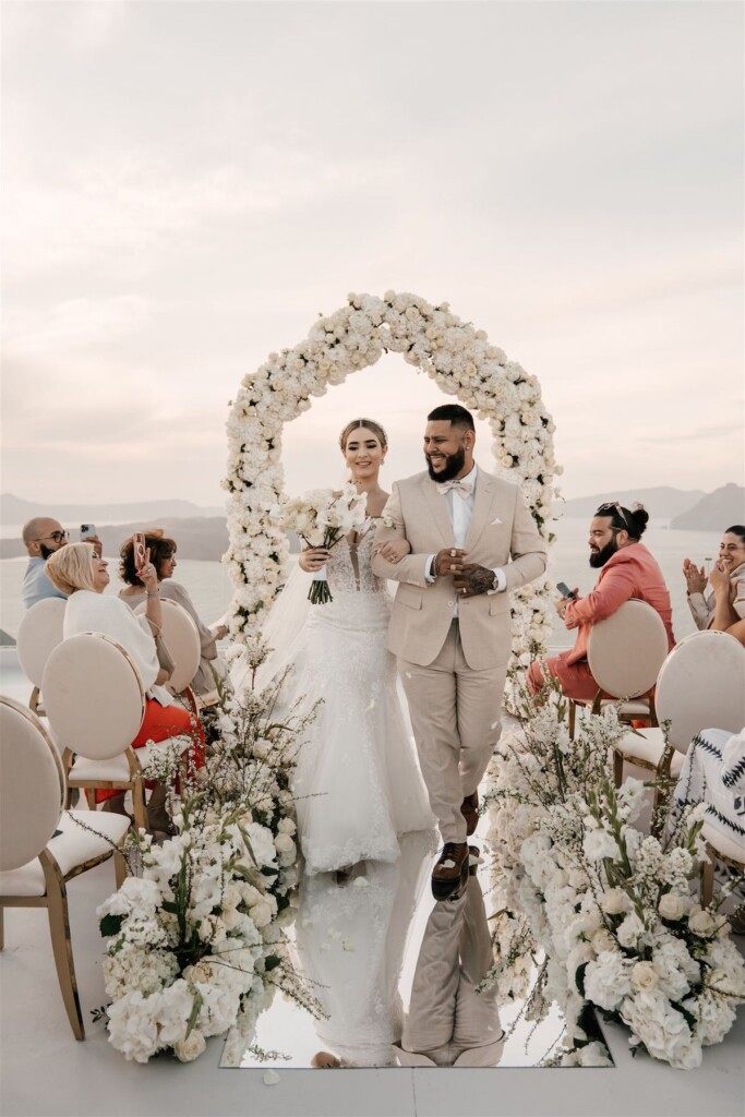 Featured in Issue 30, Jennifer and Zamir's modern & elegant elopement by the Sea in Santorini, Greece was everything they imagined and more.