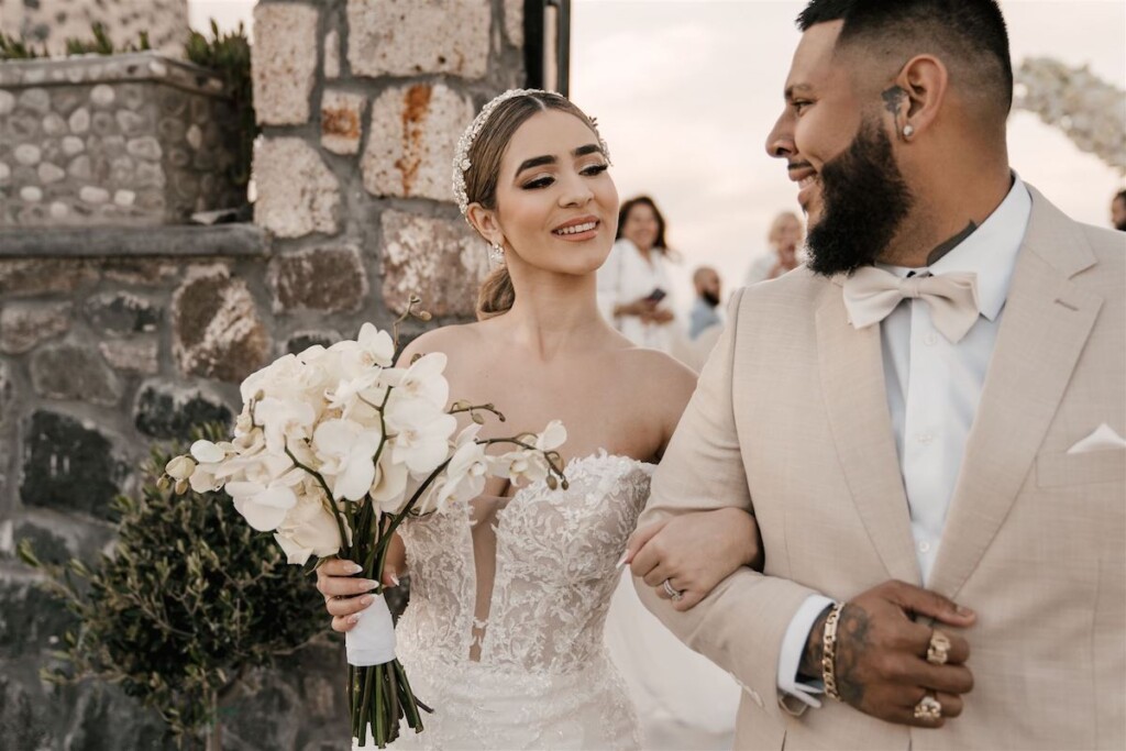 Featured in Issue 30, Jennifer and Zamir's modern & elegant elopement by the Sea in Santorini, Greece was everything they imagined and more.